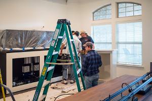 Work begins on the custom built cabinetry!